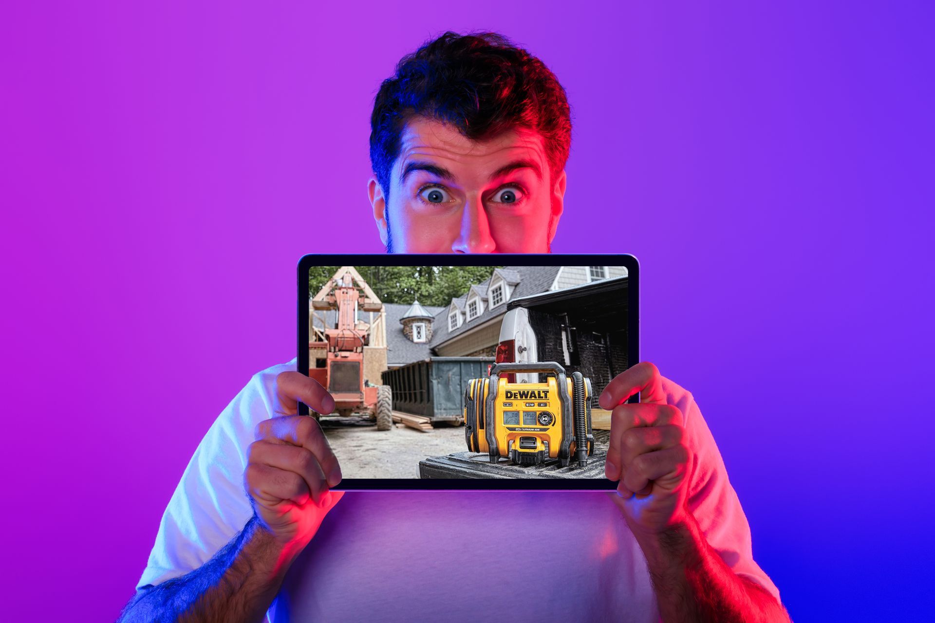 Man holding tablet showing construction site, with surprised expression, DeWALT product ad