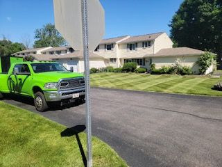 work truck parked outside residential home