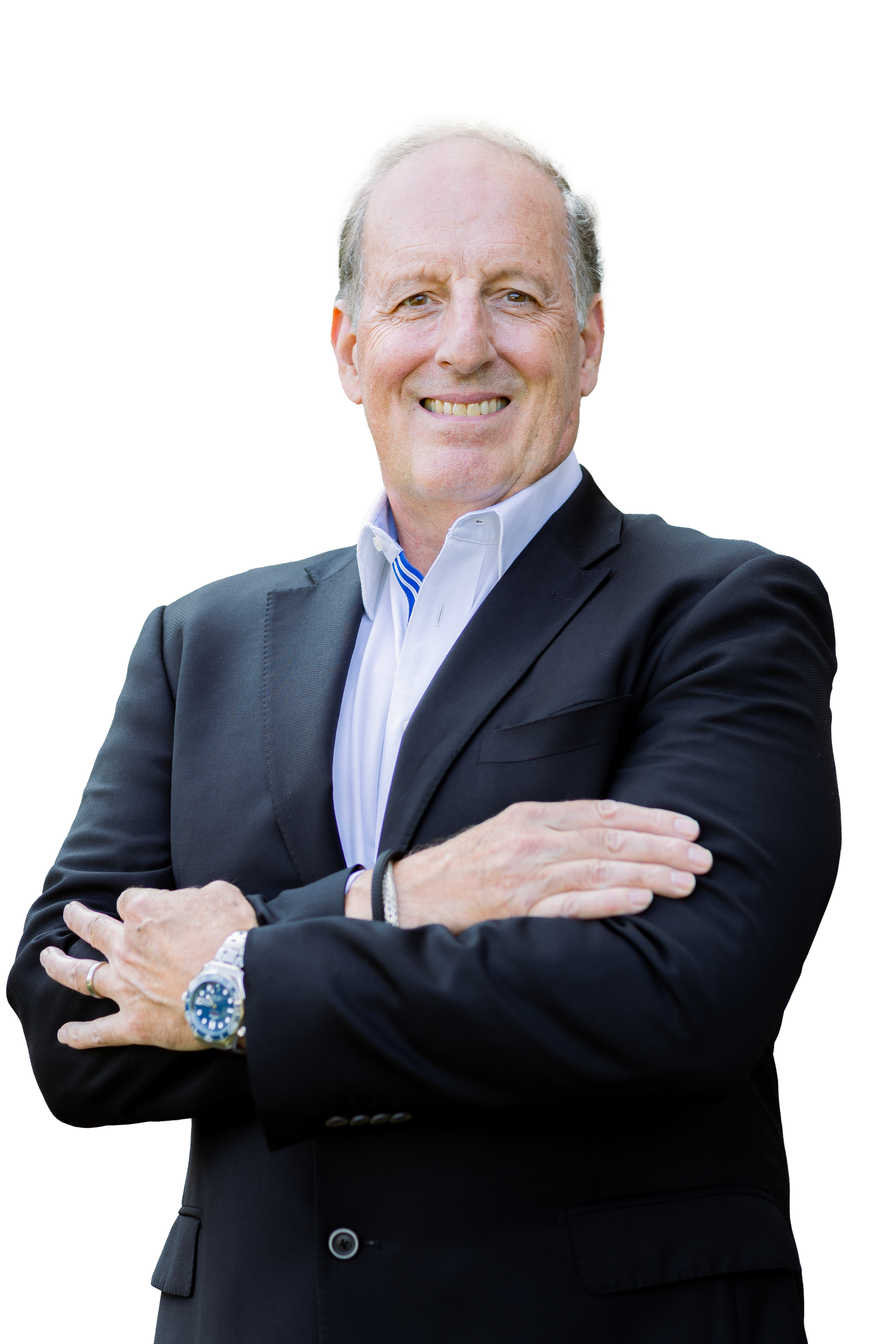 Man in suit with arms crossed, smiling.