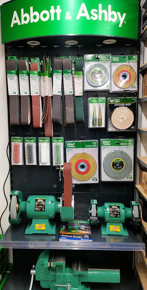 A Display Of Grinders And Sanding Pads In A Store — PT Trade Supplies in Kempsey, NSW