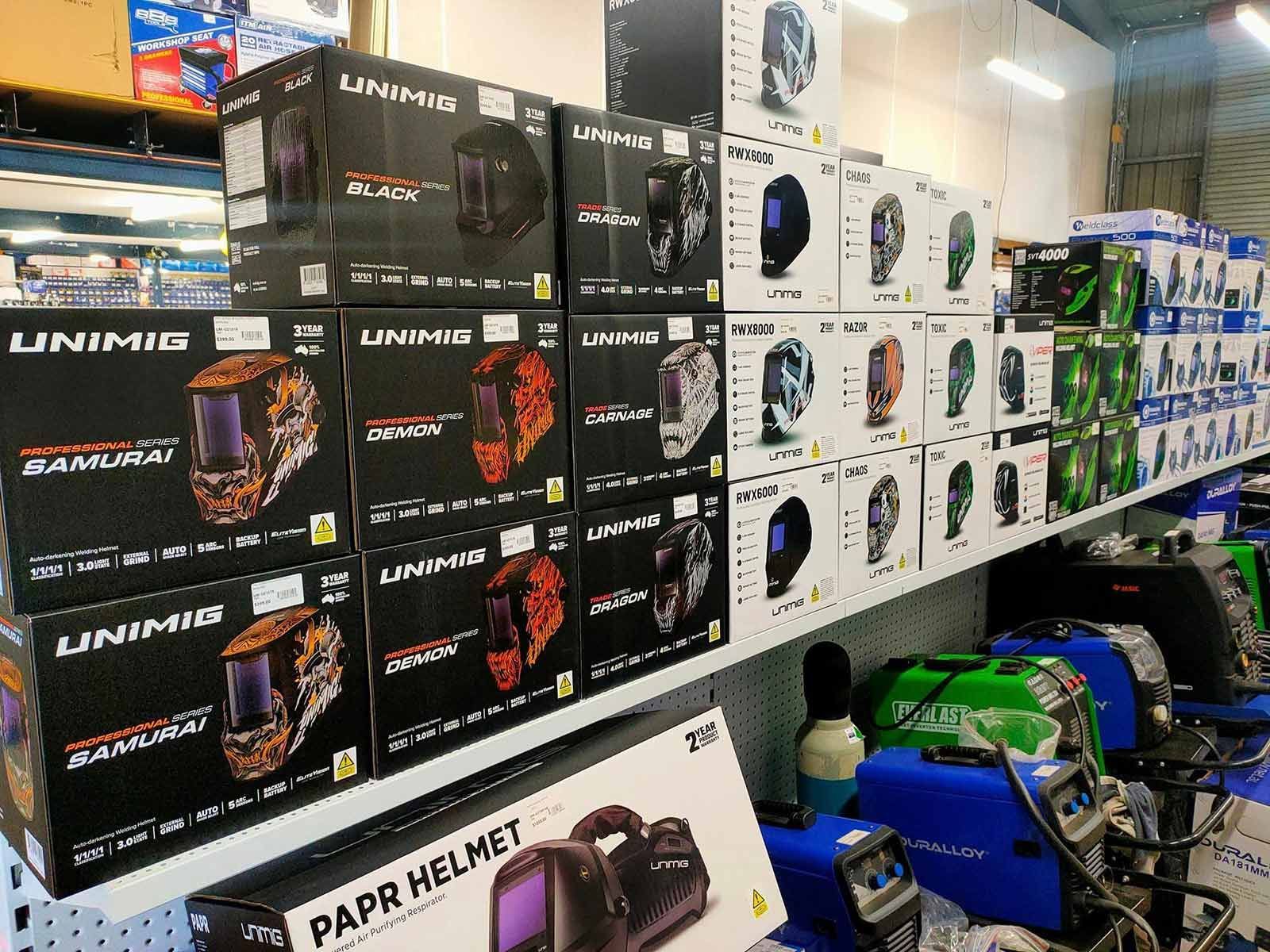 A Bunch Of Rolls Of Tape Are On A Shelf In A Store — PT Trade Supplies in Gloucester, NSW