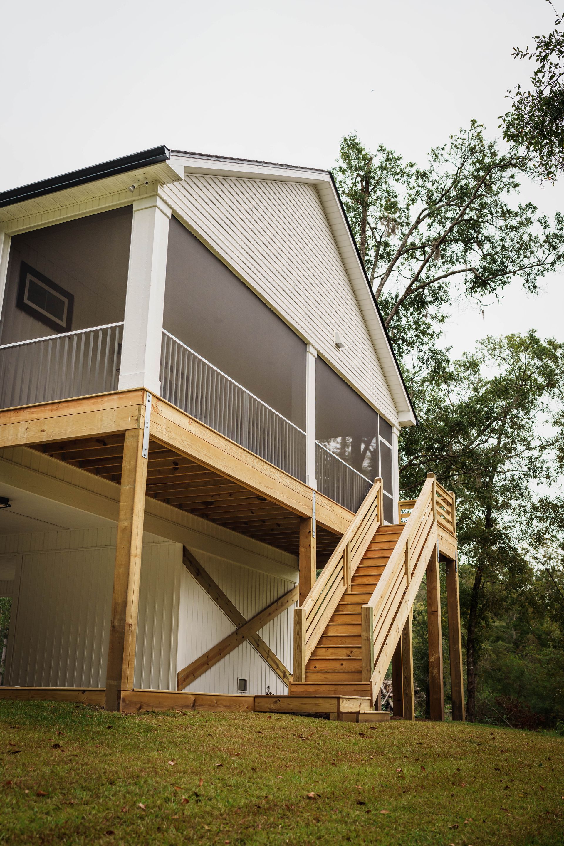 A house with a porch and stairs leading up to it