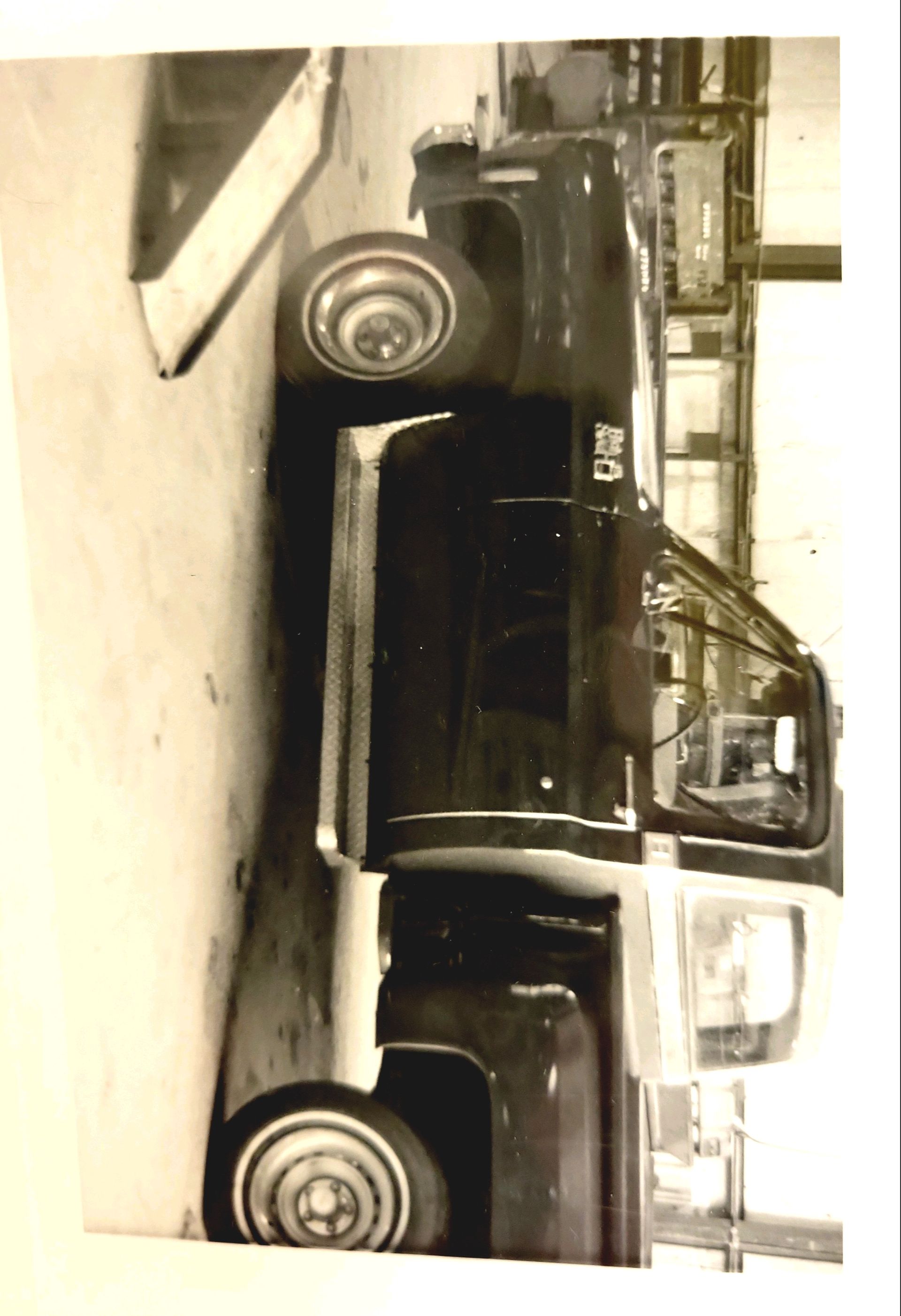 A black and white photo of a truck that says denver