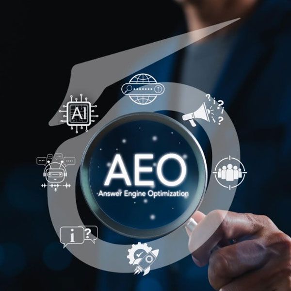 Hand holding magnifying glass over AEO logo with search and AI icons on dark background