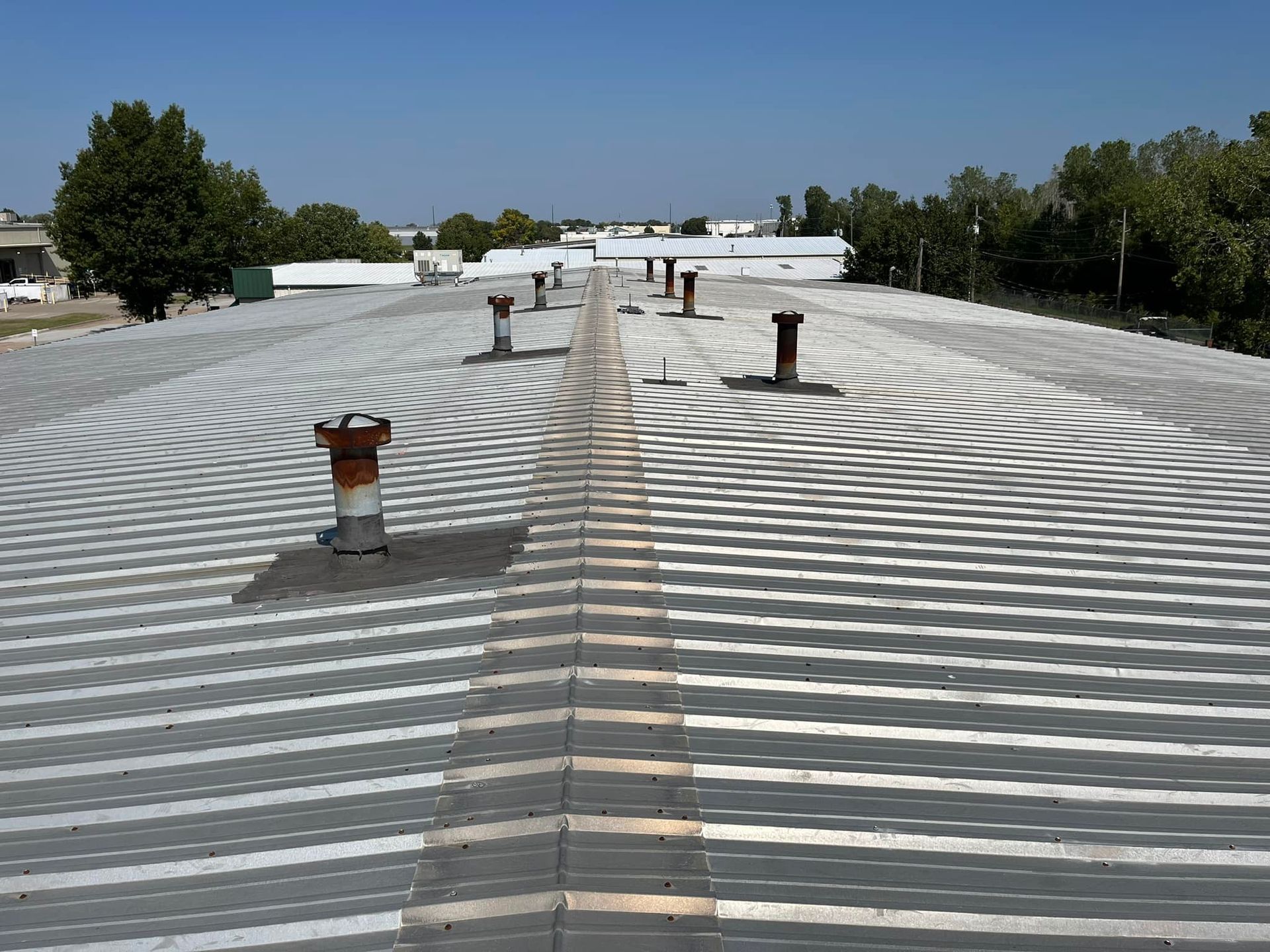 A roof with a lot of vents on it