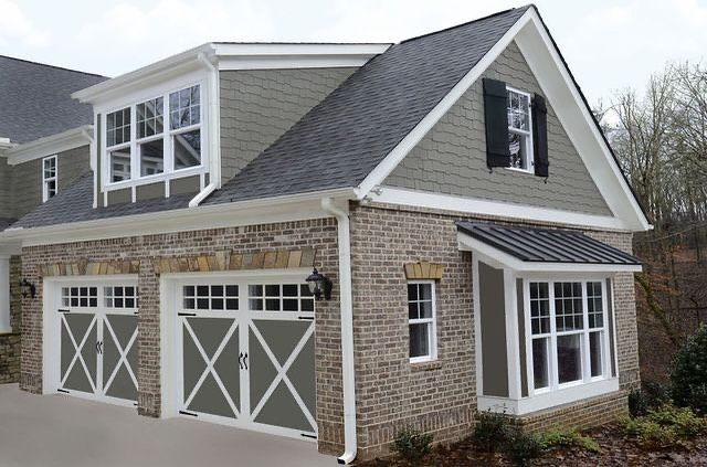 A large brick house with a gray roof