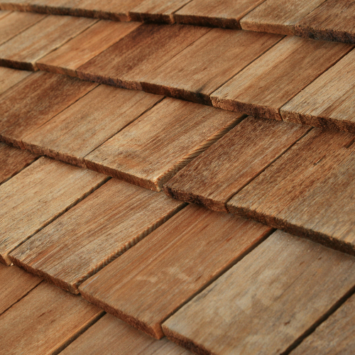 A close up of a wooden shingle roof