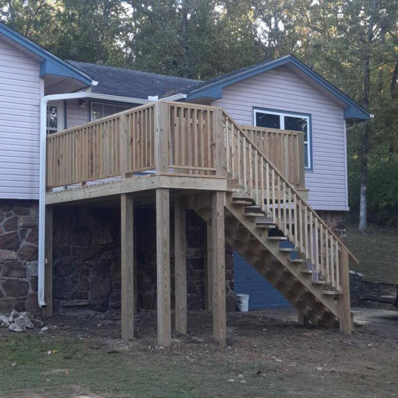 A House With a Wooden Deck and Stairs