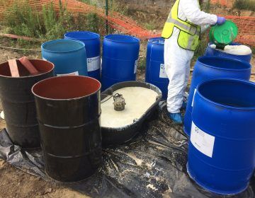 Technical field staff executing hazardous material clean up