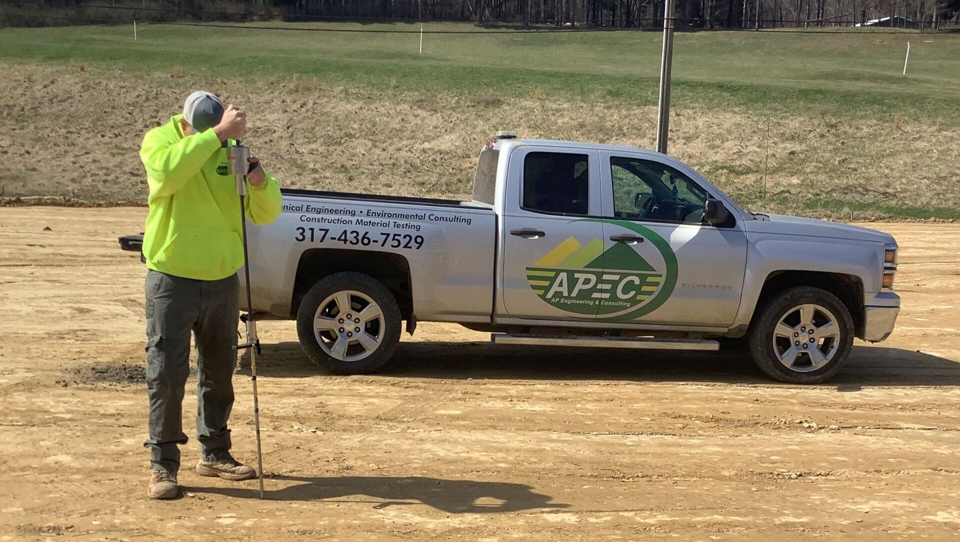 APEC technical field staff member conducting testing and sampling service for construction site
