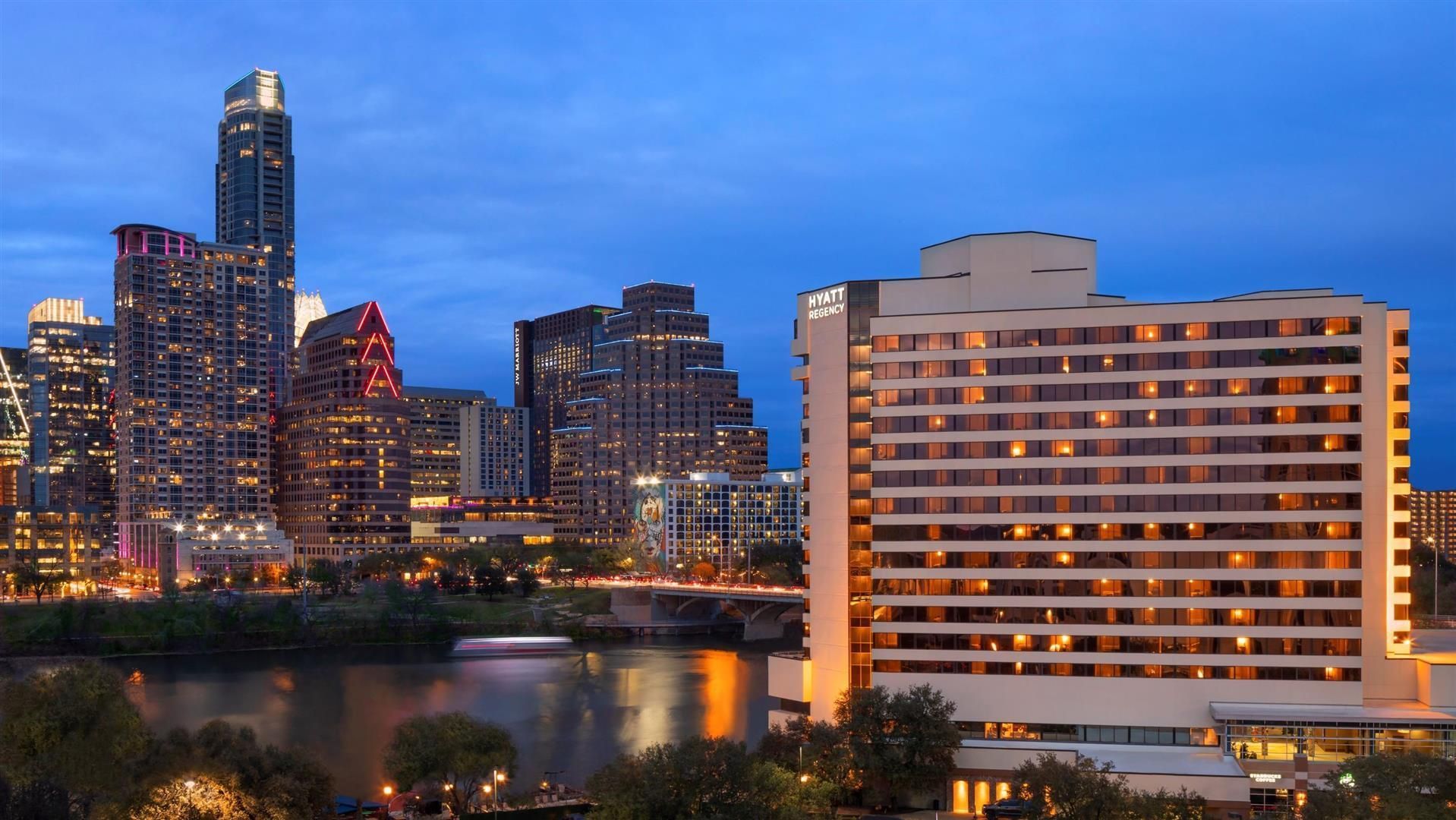 Hyatt Regency Austin renovated rooms lobby and Lady Bird Lake views in downtown Austin Texas