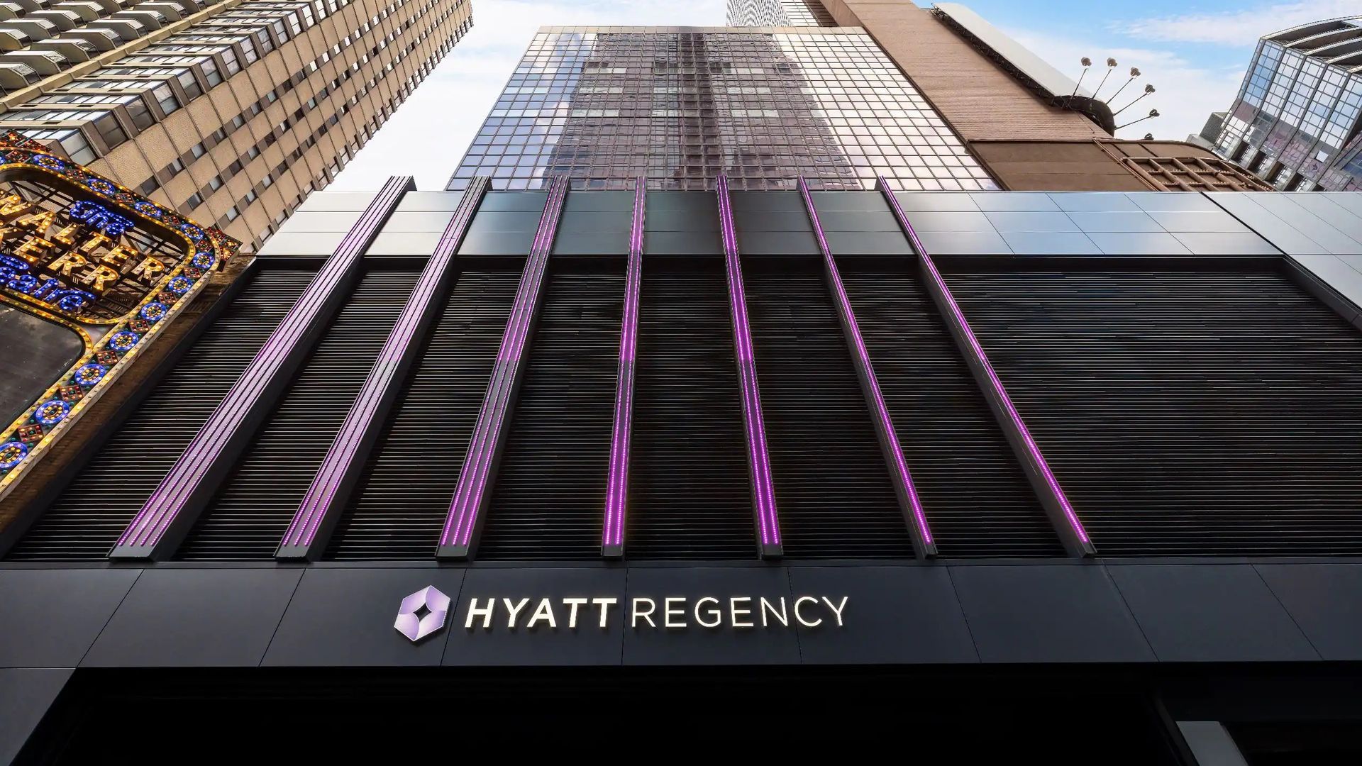 Hyatt Regency Times Square New York 795-room hotel at 1605 Broadway with two-story lobby and glass atrium