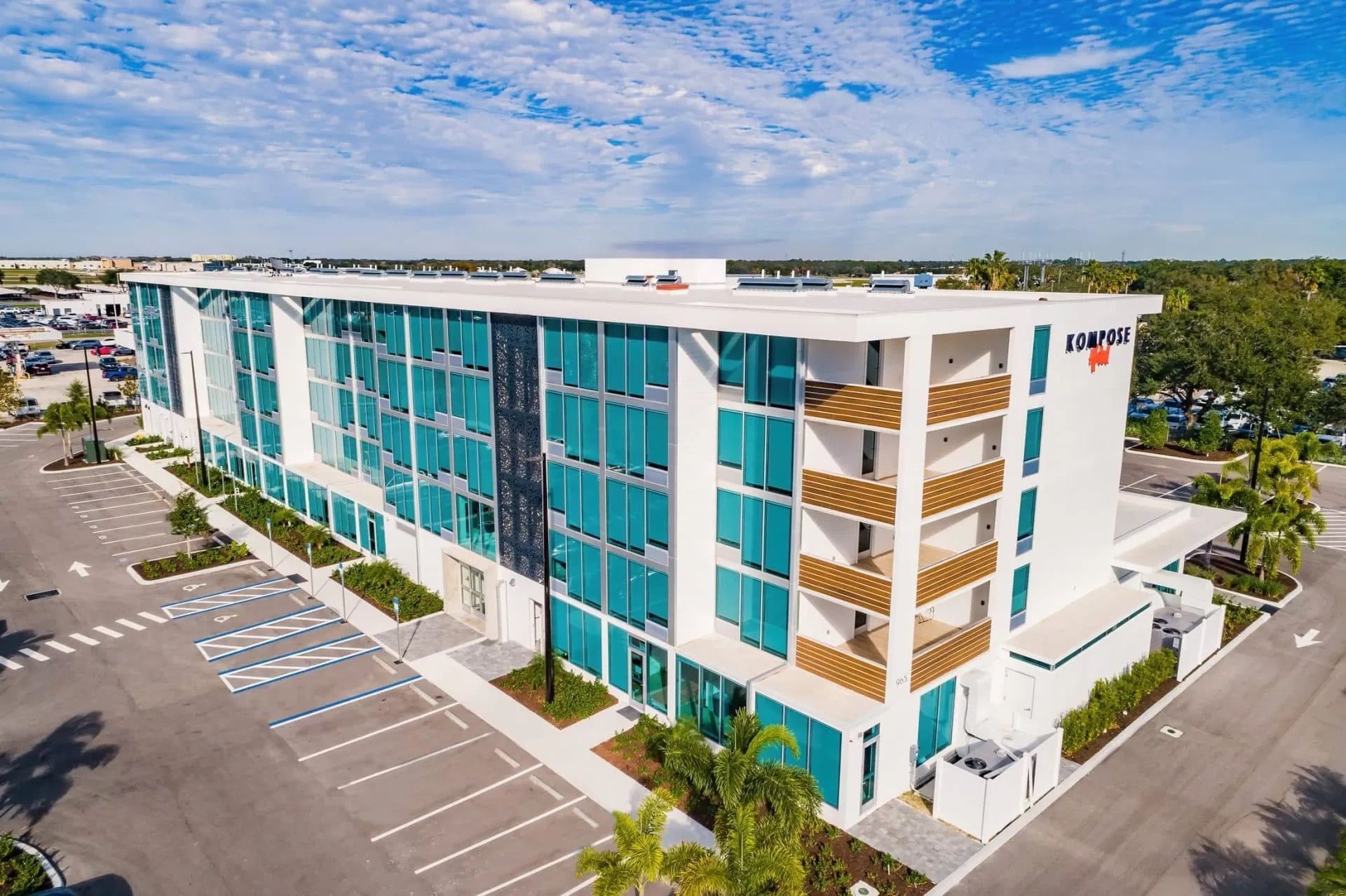 Kompose Hotel Sarasota Florida tech forward modern boutique hotel Koncrete Kreativity theme pool near Sarasota Bradenton Airport