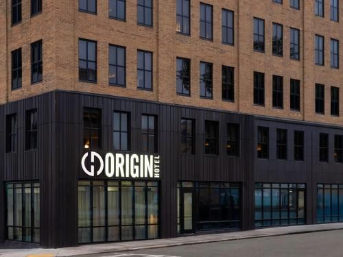 Origin Atlanta a Wyndham Hotel boutique hotel historic South Downtown Atlanta opened 2025 adaptive reuse Georgia