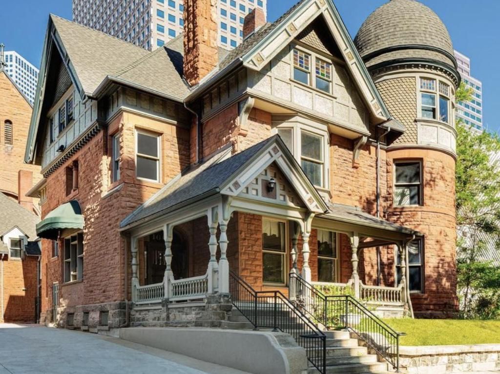 Urban Cowboy Denver Colorado opened October 2024 historic George Schleier Mansion Capitol Hill luxury Western boutique hotel eight fireplaces public house bar