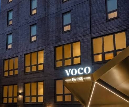 voco Astoria by IHG boutique hotel exterior in Astoria Queens New York opened August 2025