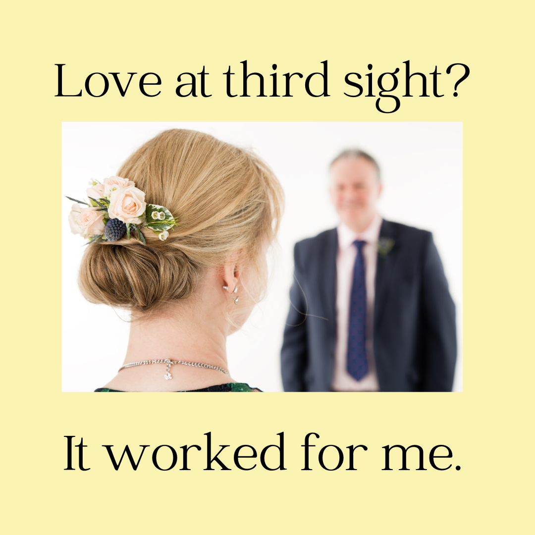 A woman with flowers in her hair stands facing a blurred man in a suit, with text reading: 