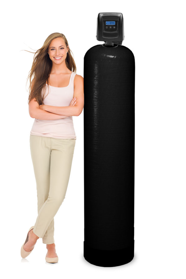Stock Photo of Woman leaning against water filtration tank