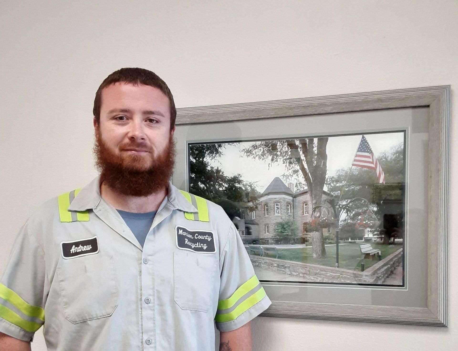 ANDREW STROUD, LICENSED MASTER standing in his uniform posing for a picture