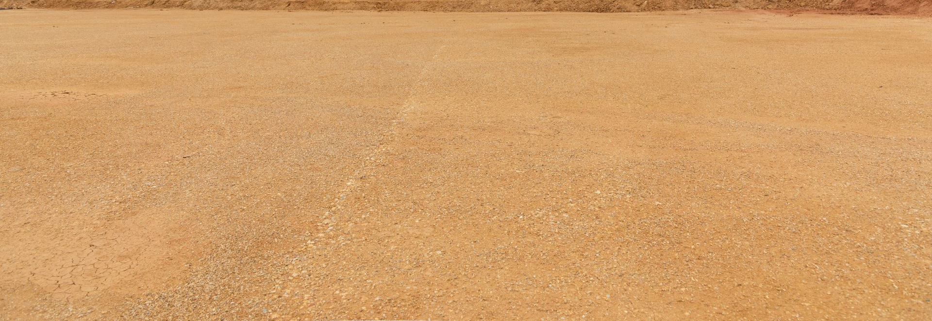 a Vast Expanse of Tan, Gravelly Ground — Australian Sandstone Products In Gold Coast, QLD