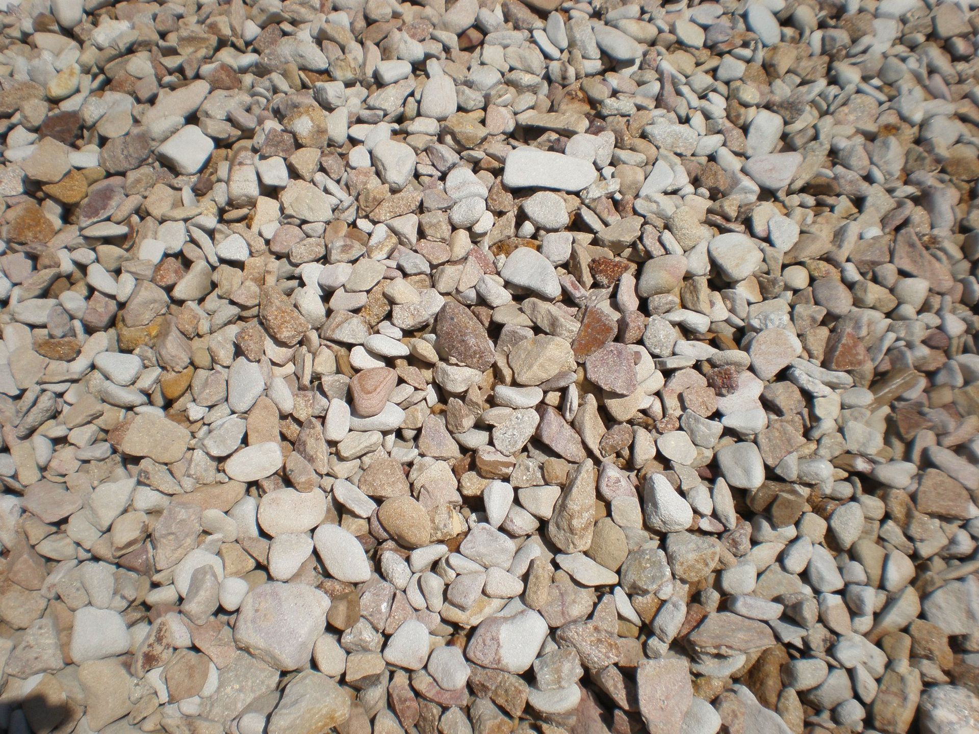 Pile of Tan and Brown Gravel — Australian Sandstone Products In Helidon, QLD