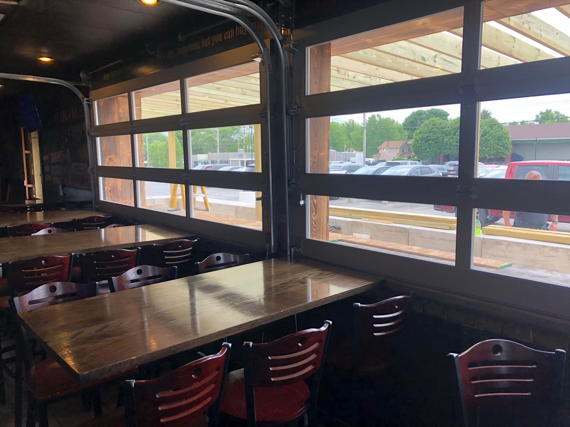 The inside of a restaurant with tables and chairs