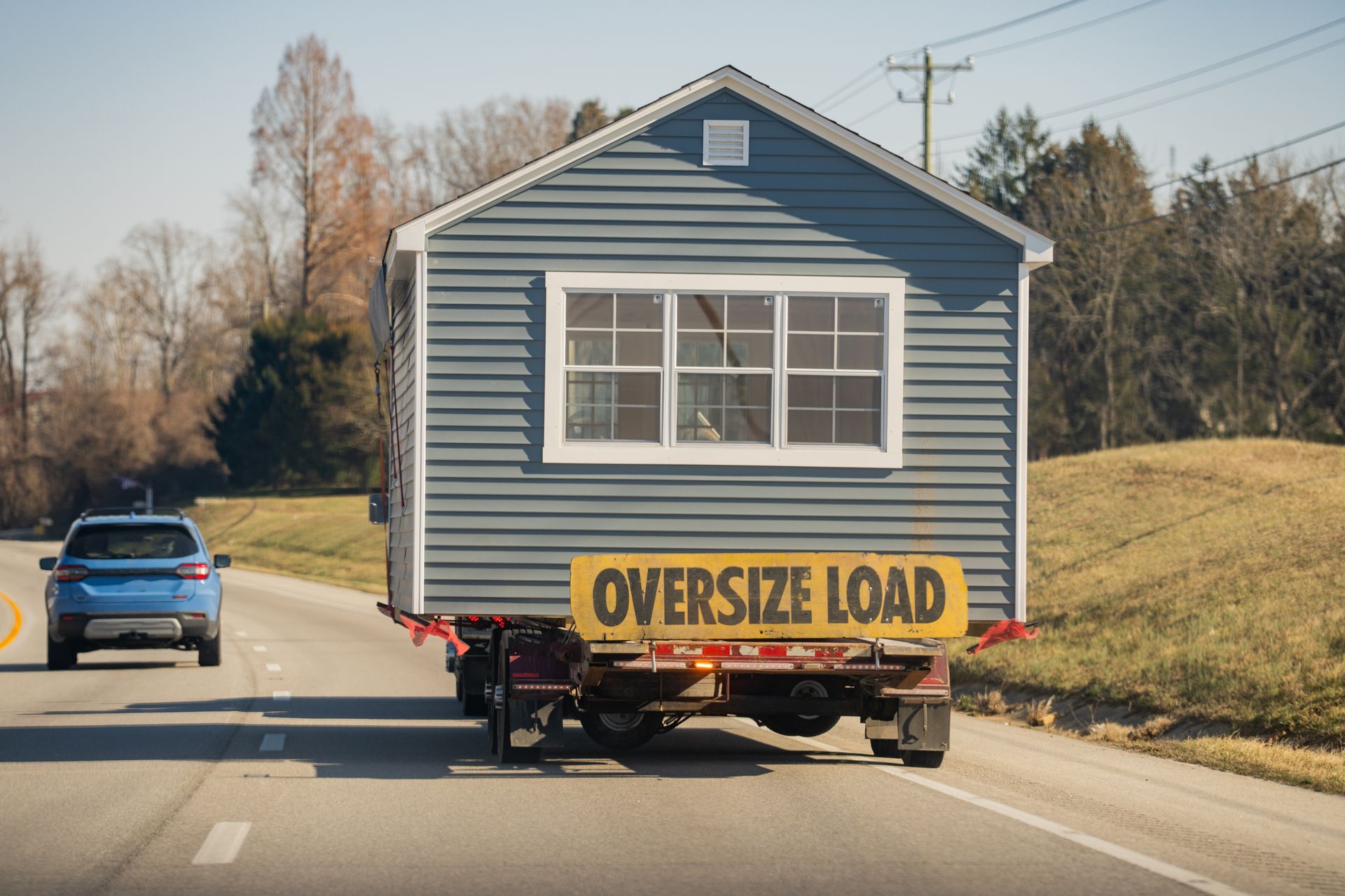 Tiny house on a trailer, labeled 