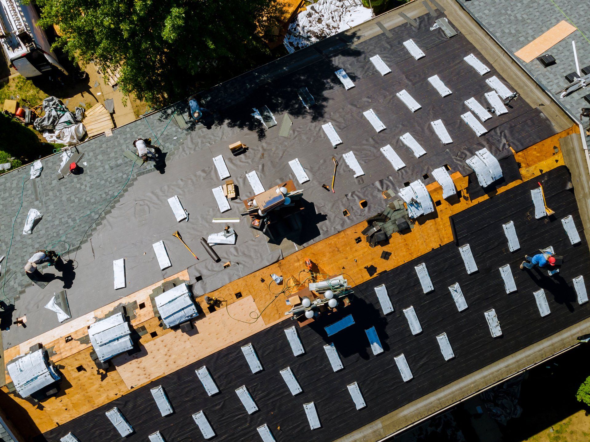 roofing experts handle a full service roofing system
