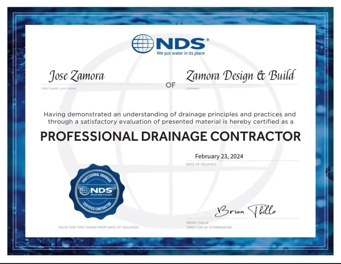 NDS Professional Drainage Contractor certificate with blue border and signatures