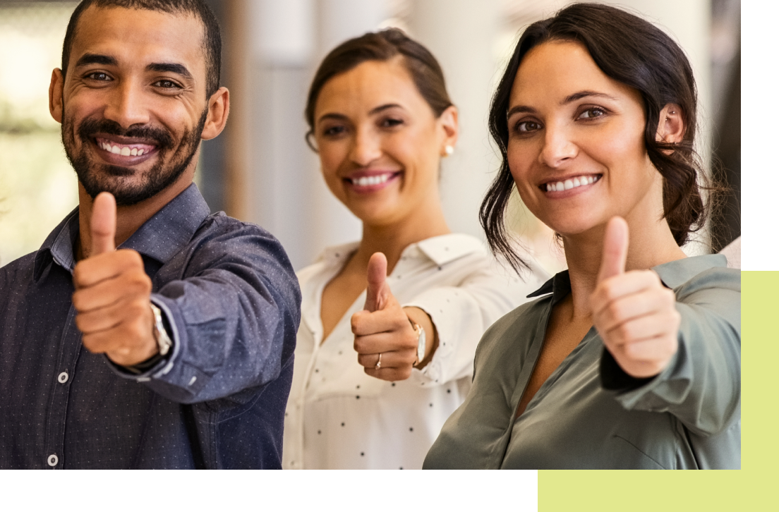 Three people smiling and giving thumbs up.