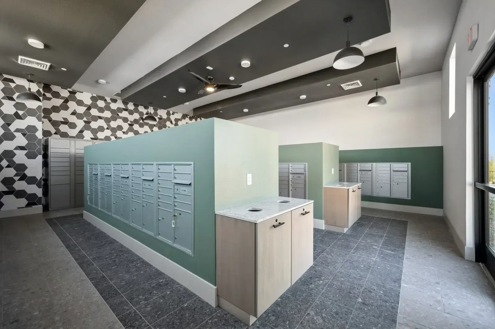 Mailroom with mailboxes and package lockers at Longbow Luxury apartments in Mesa, AZ.