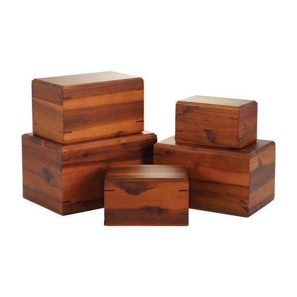 Stacked wooden boxes with matching lids on a white background