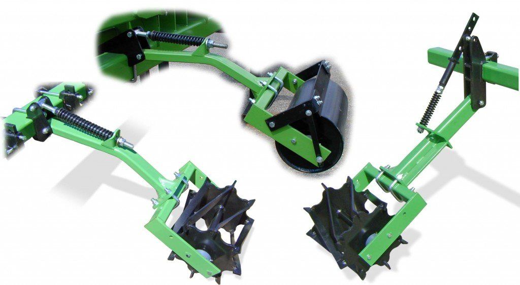 A picture of a green and black machine on a white background