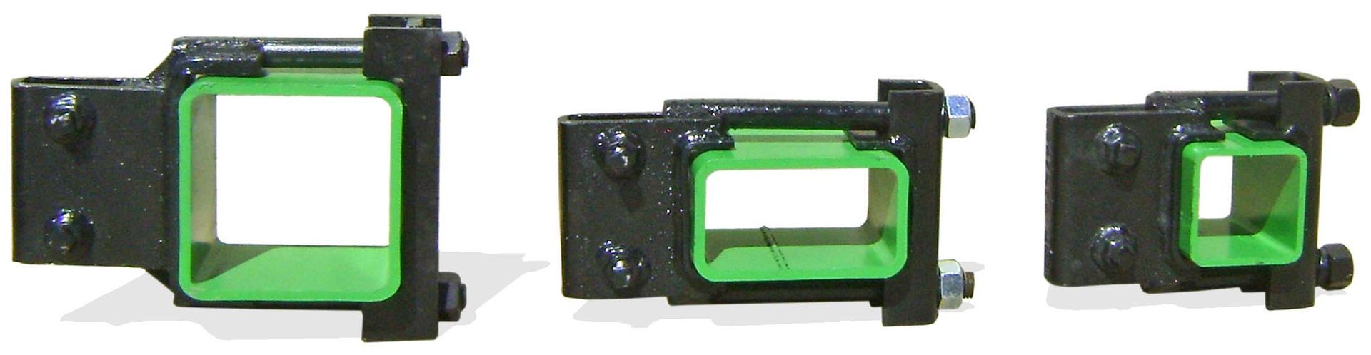Three green squares are sitting next to each other on a white surface.