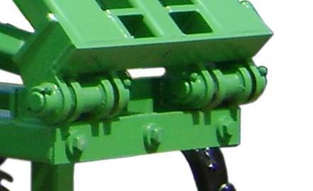 A close up of a green machine on a white background.