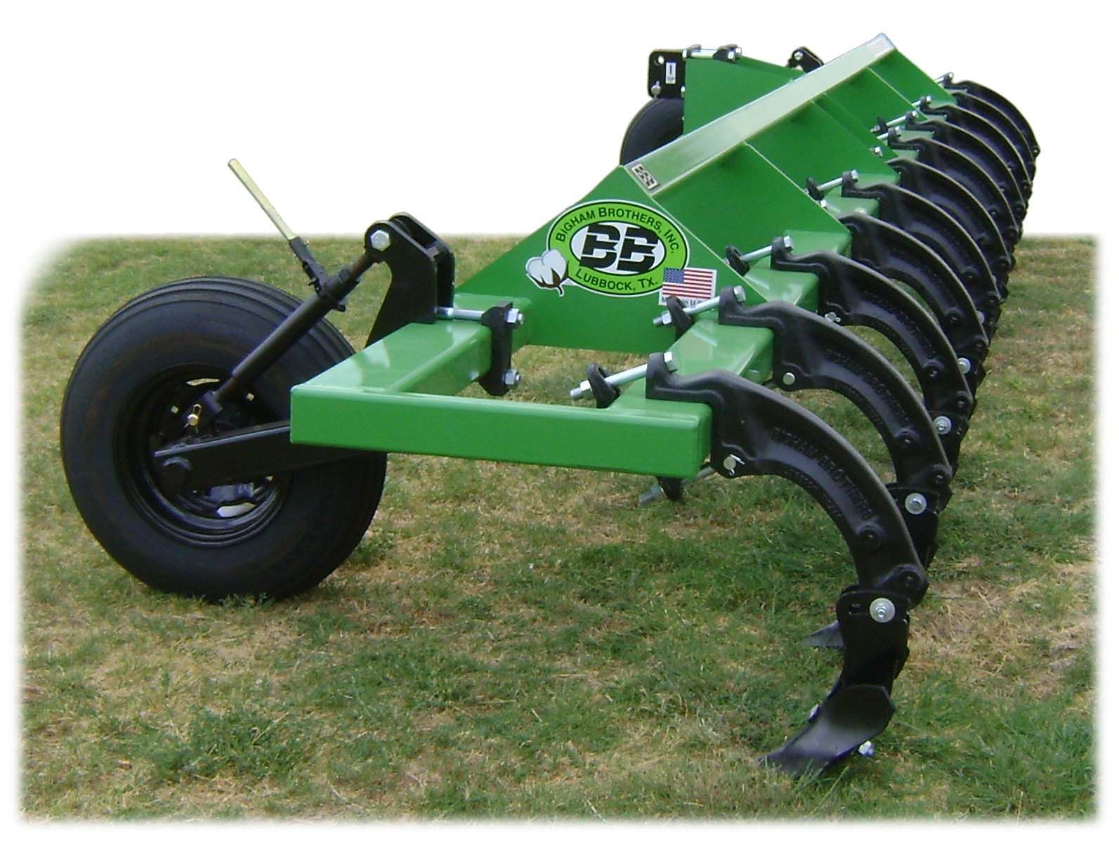 A green and black machine with a cb logo on it