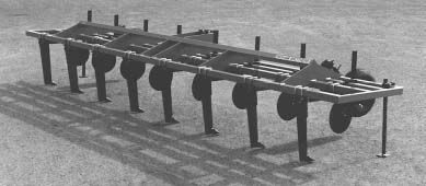 A black and white photo of a very long metal structure