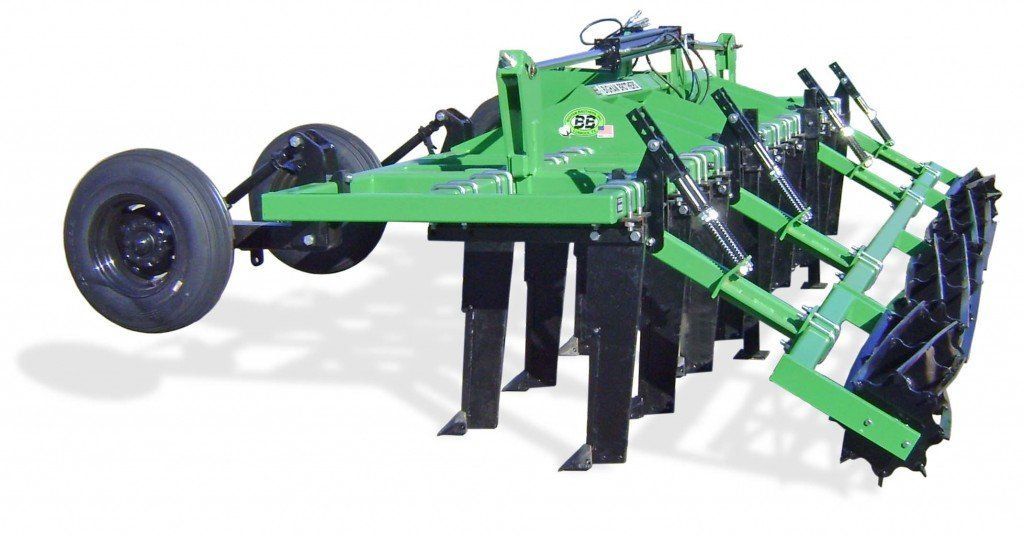 A green and black tractor with wheels on a white background.