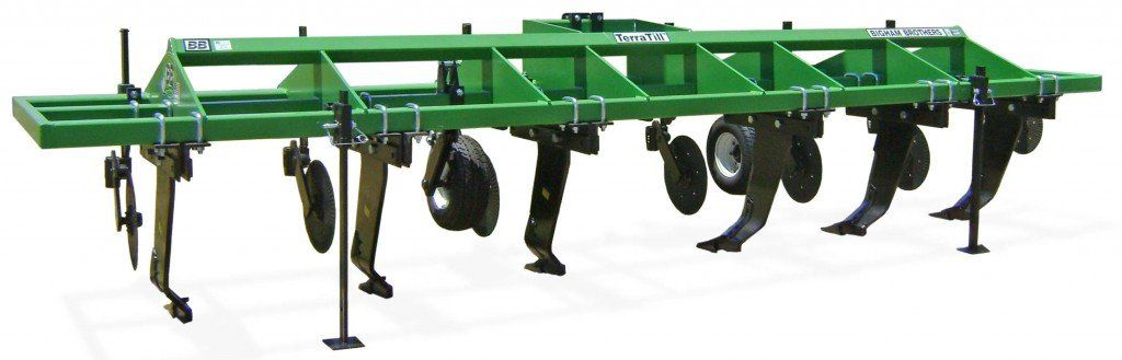 A green and black machine with a white background