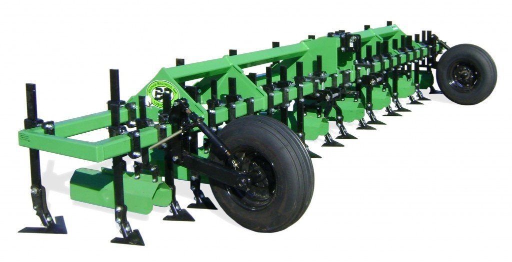 A green tractor with black wheels on a white background
