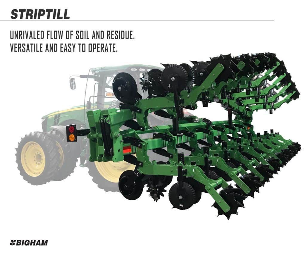 A tractor with a striptill attached to it