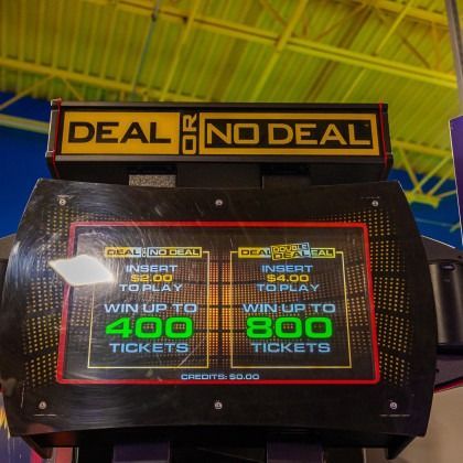 Deal or No Deal game display showing “insert $100,” “win up to 400 tickets,” and “win up to 800 tickets”