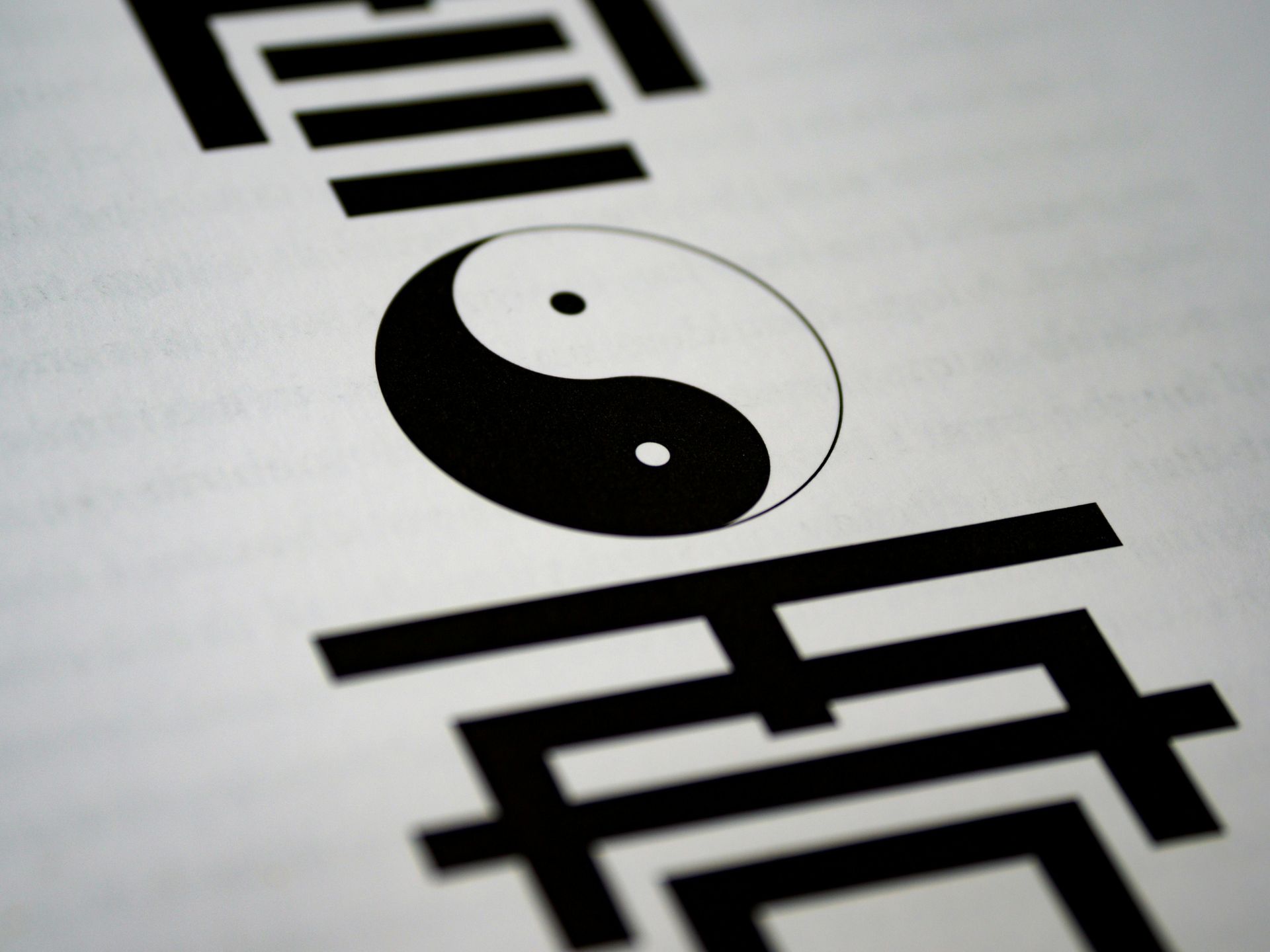 A black and white image of a yin yang symbol