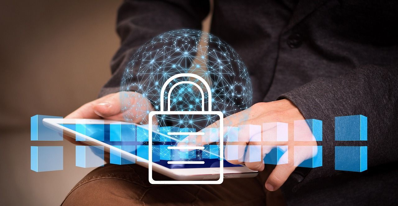 Digital lock icon over a tablet symbolizing online security, brand protection, and website takedown