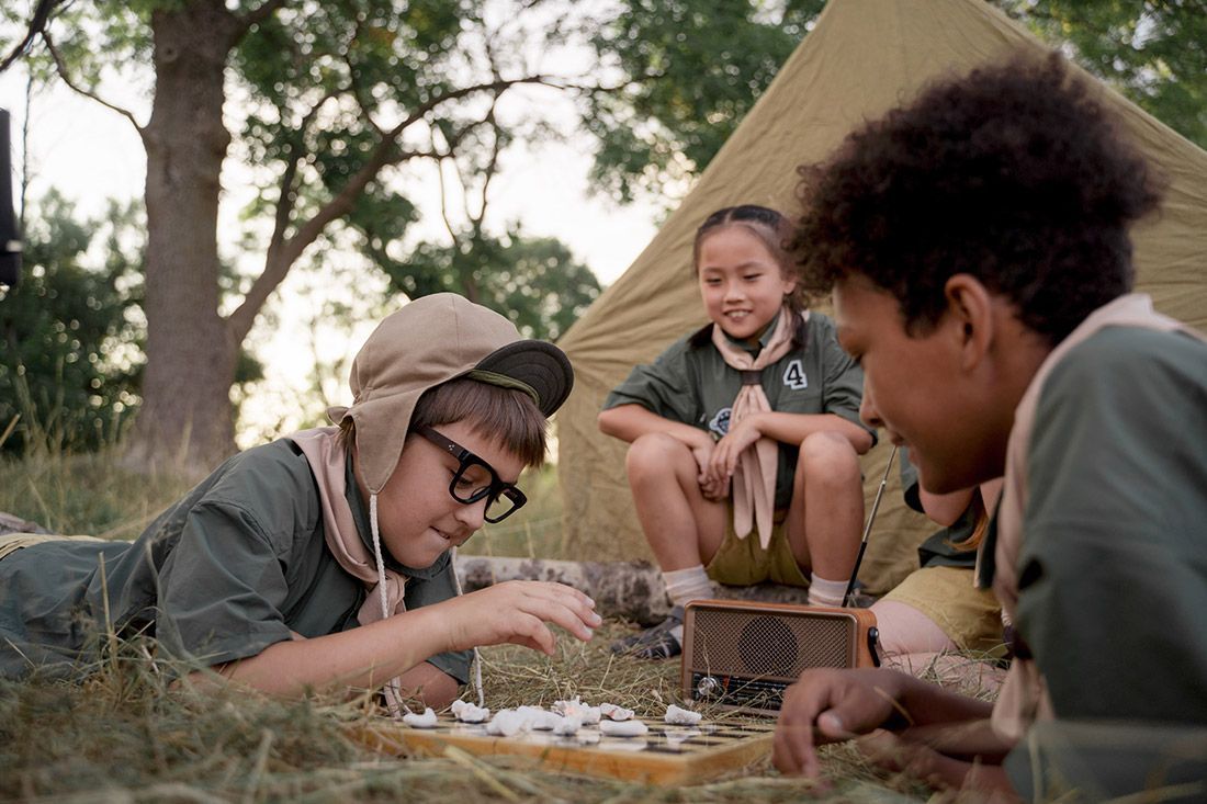 Group of Kids Enjoying a Board Game - Autism + Support