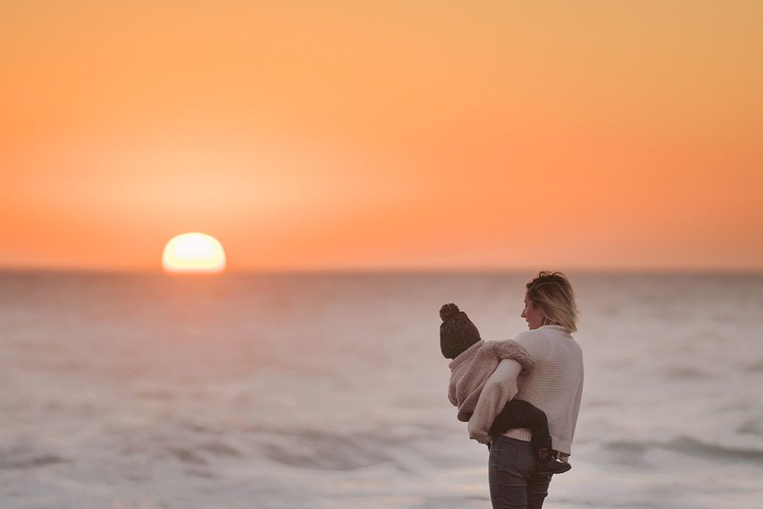 Mother and Child Enjoying Sunset - Autism + Child Mother and Child Enjoying Sunset - Autism + Child