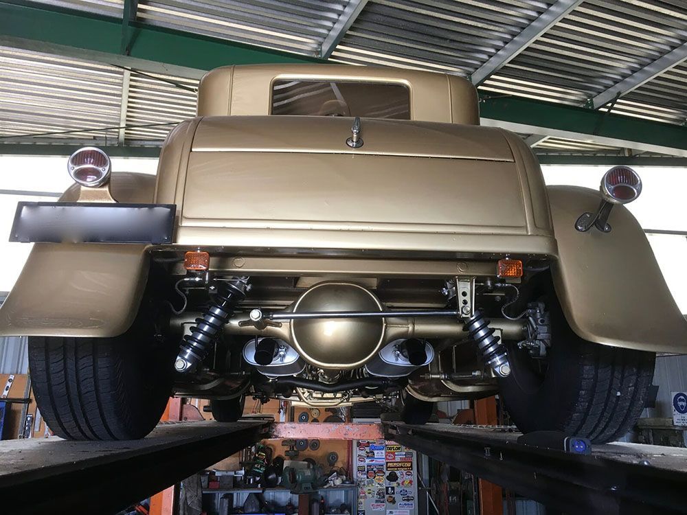 Gold car Car — Wodonga Exhaust Centre in Wodonga, VIC
