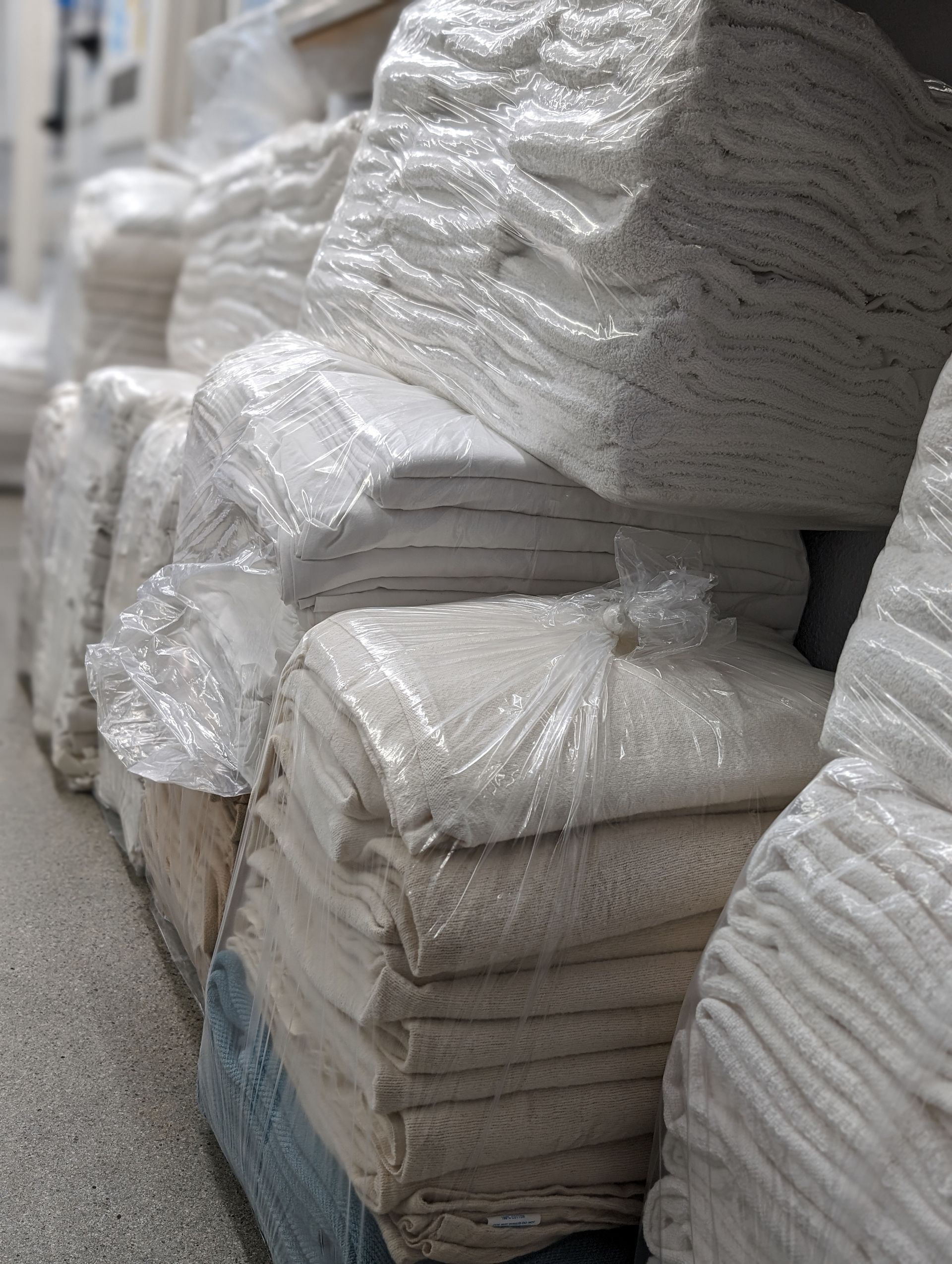 Commercial linens folded and ready for delivery by Fresh Laundries in Fairfield, California