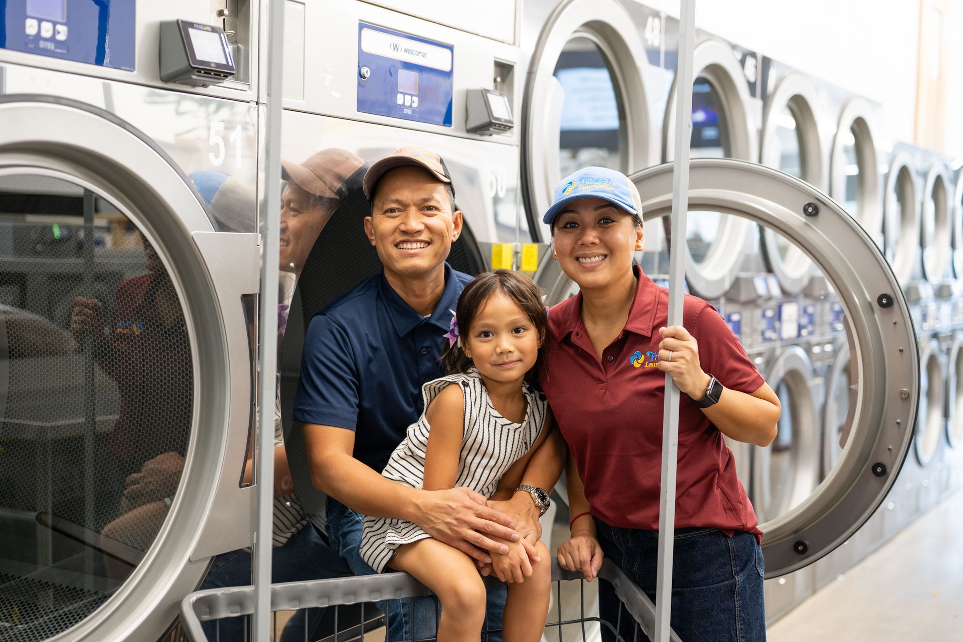 The Fresh Laundries family inside their Fairfield laundromat