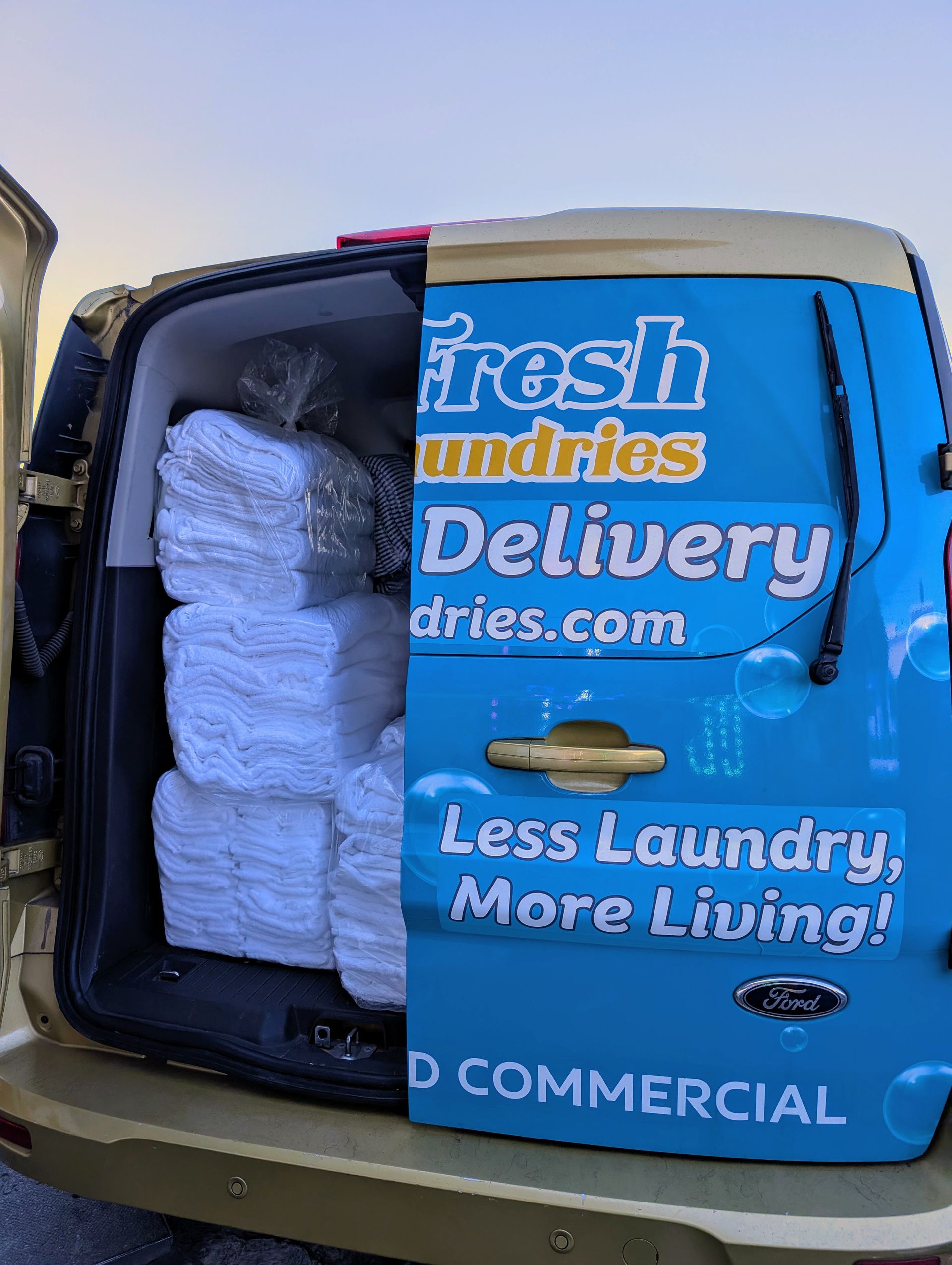 Folded linens and laundry prepared by Fresh Laundries in Fairfield, California